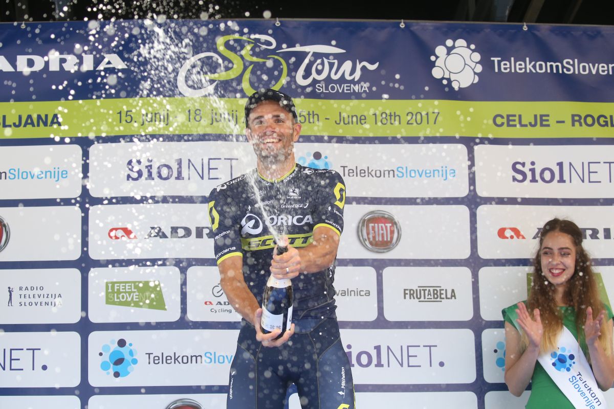 Luka Mezgec (Orica-Scott) sprays the champagne