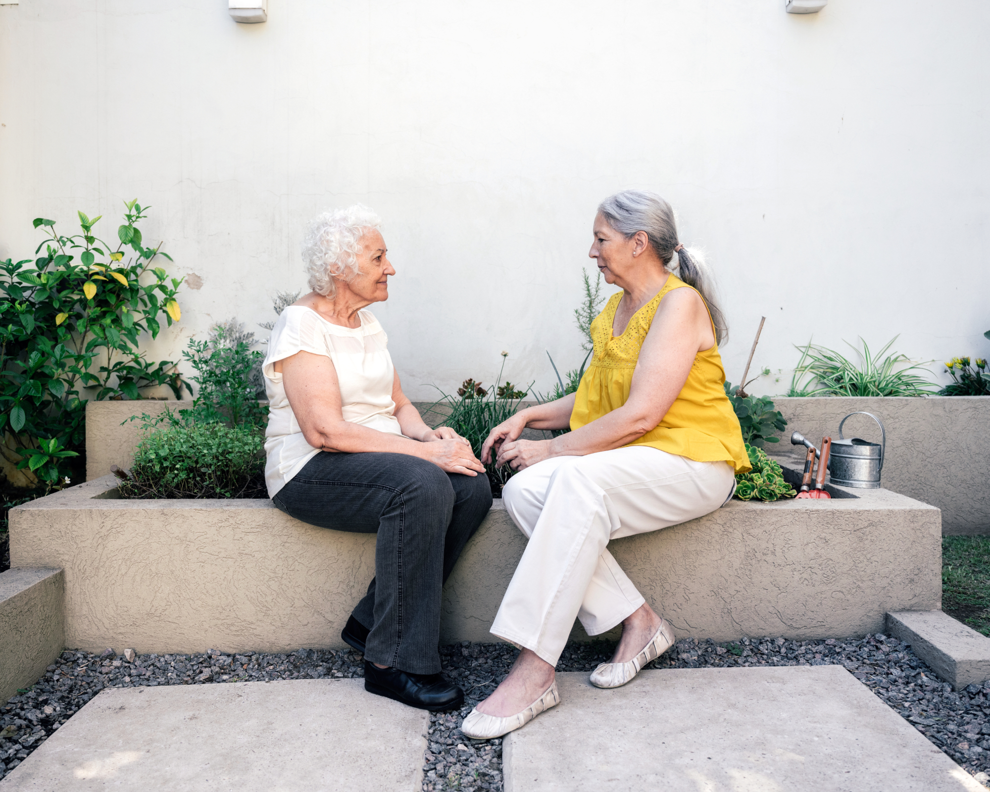 Women talking in a garden