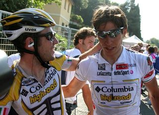 Team Columbia - Highroad teammates Mark Cavendish and Thomas Lövkvist share a word after Cavendish's victory.