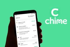  online payment and banking app Chime logo is seen on the screen of a mobile phone and in the background