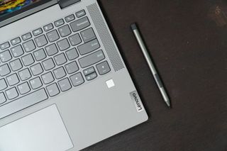 A Lenovo laptop's keyboard and stylus pen