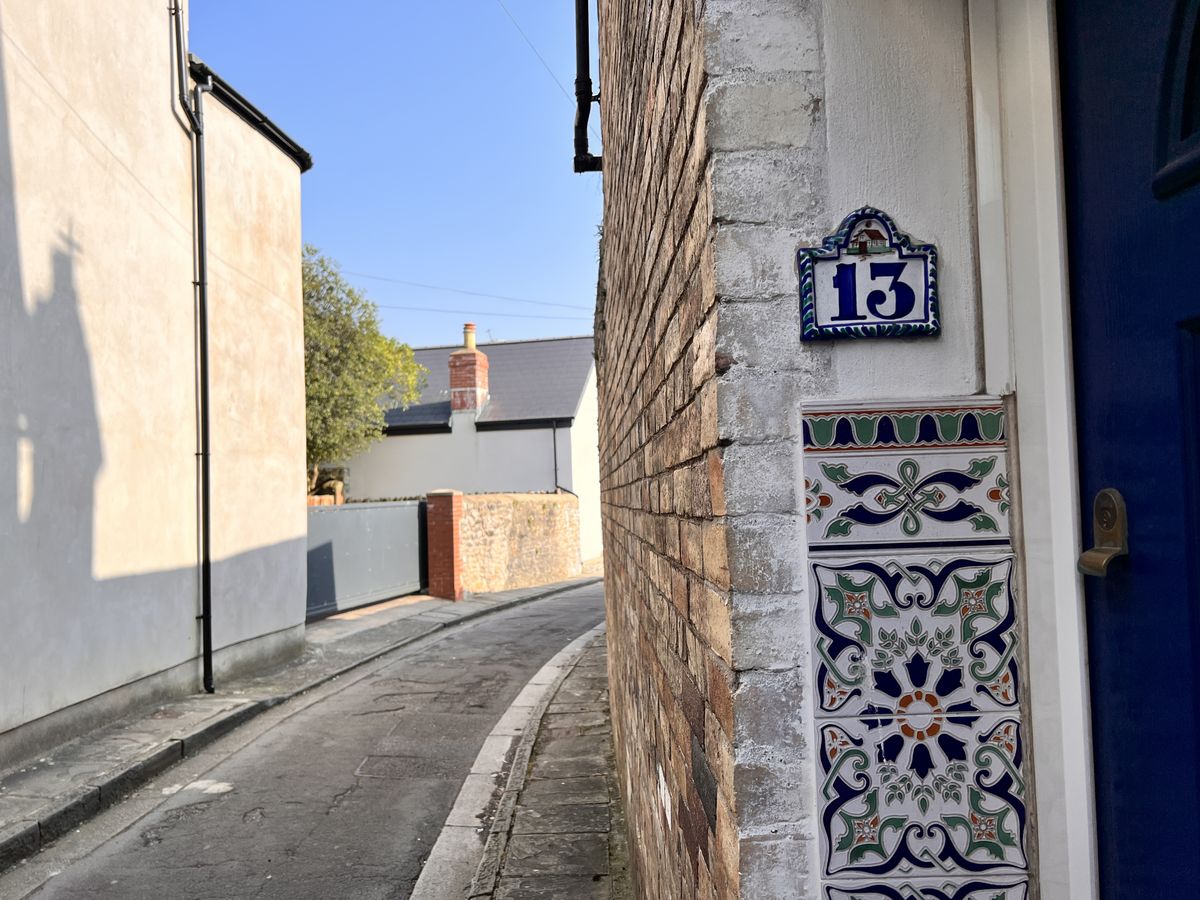 A road passing between two buildings