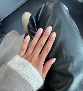 Iram Shelton wearing OPI bubble bath nails