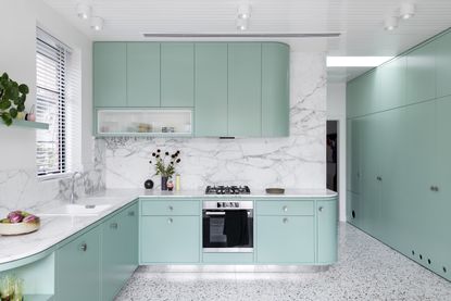 Mint green kitchen by Lisa Breeze