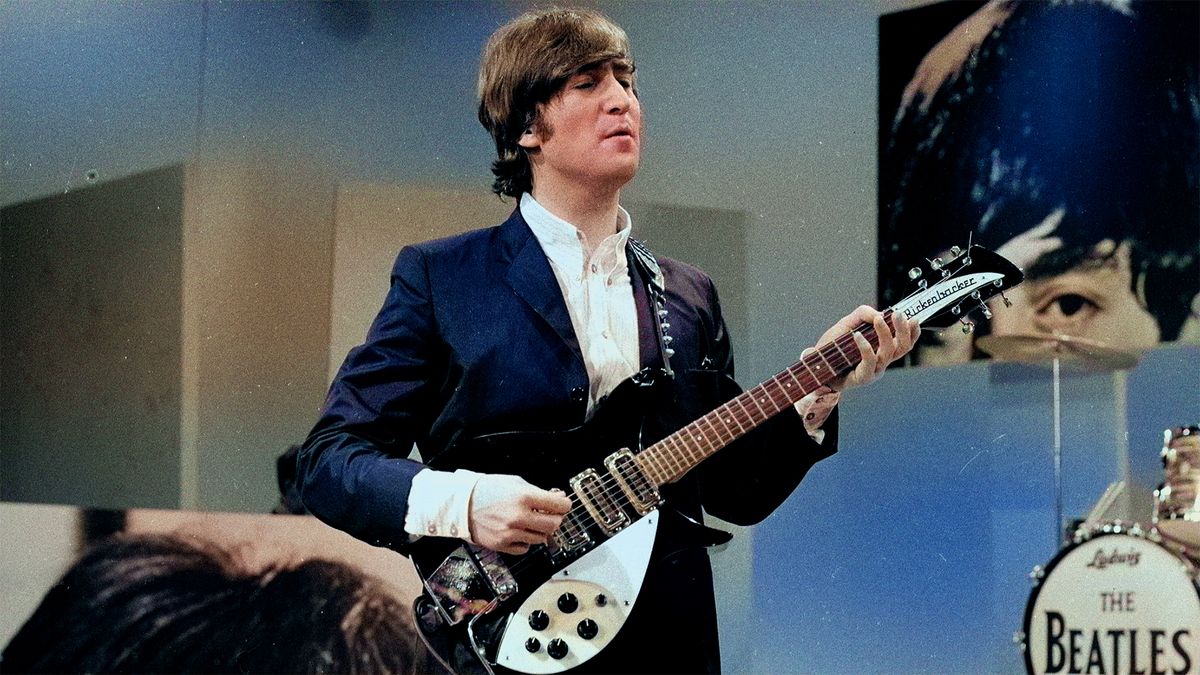 John Lennon of The Beatles during rehearsal for the third appearance on The Ed Sullivan Show. Image dated August 14, 1965. 