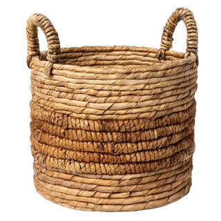 a large rounded woven basket with handles