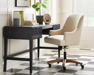 Target office chair cream with check floor at black desk