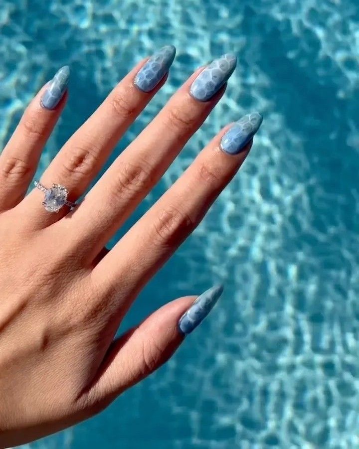 Photo of Zola Ganzorigt wearing pool water nails