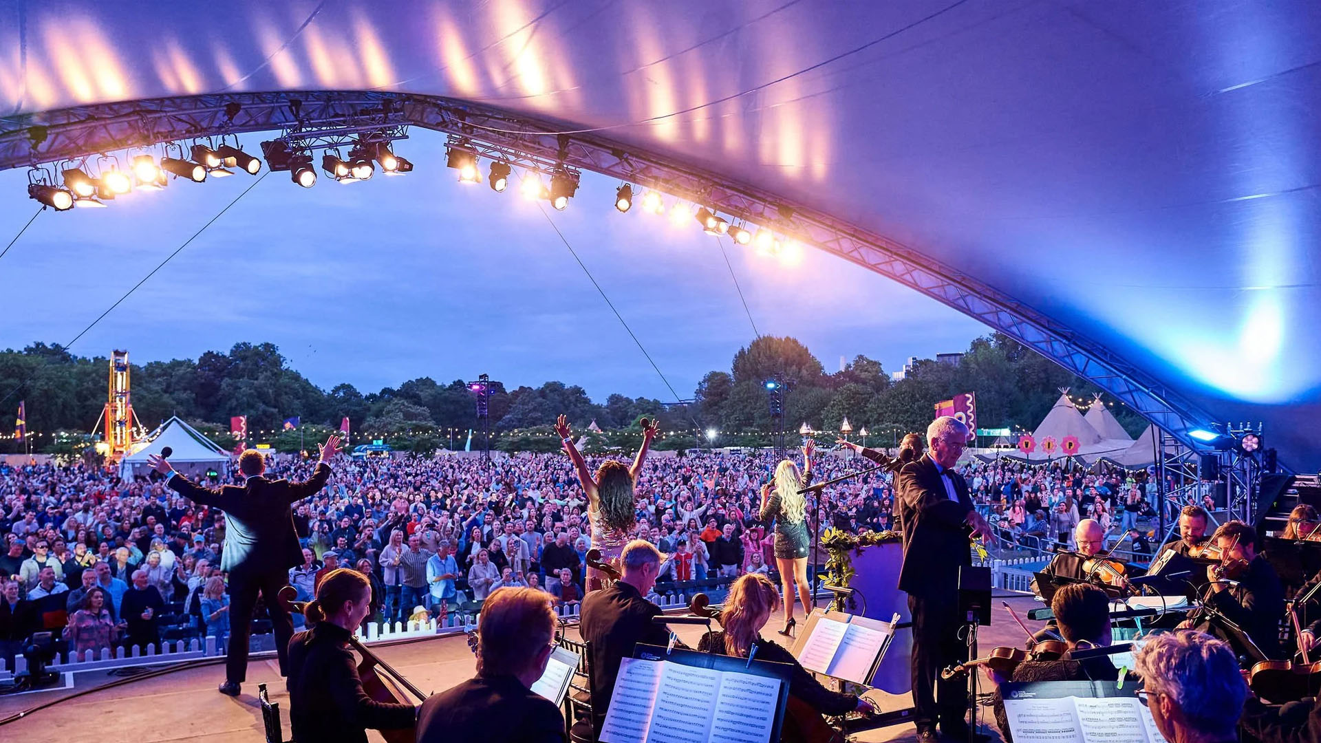 A photo of an orchestra. 