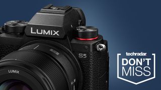 The Panasonic Lumix S5 camera on a blue background next to a logo