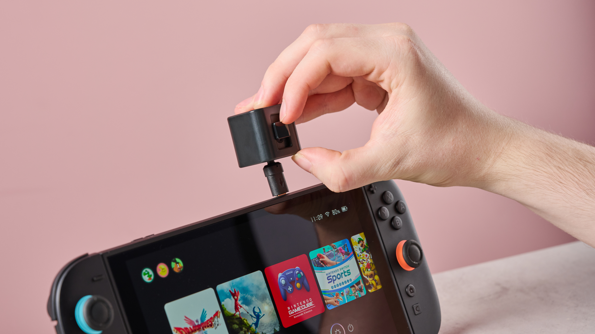 Man activating privacy shutter on the Hori USB Camera for Nintendo Switch 2