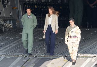 Catherine, Duchess of Cambridge walks off a C17 transporter plane as she speaks to those who supported the UK's evacuation of civilians from Afghanistan, at RAF Brize Norton on September 15, 2021 in Brize Norton, England.