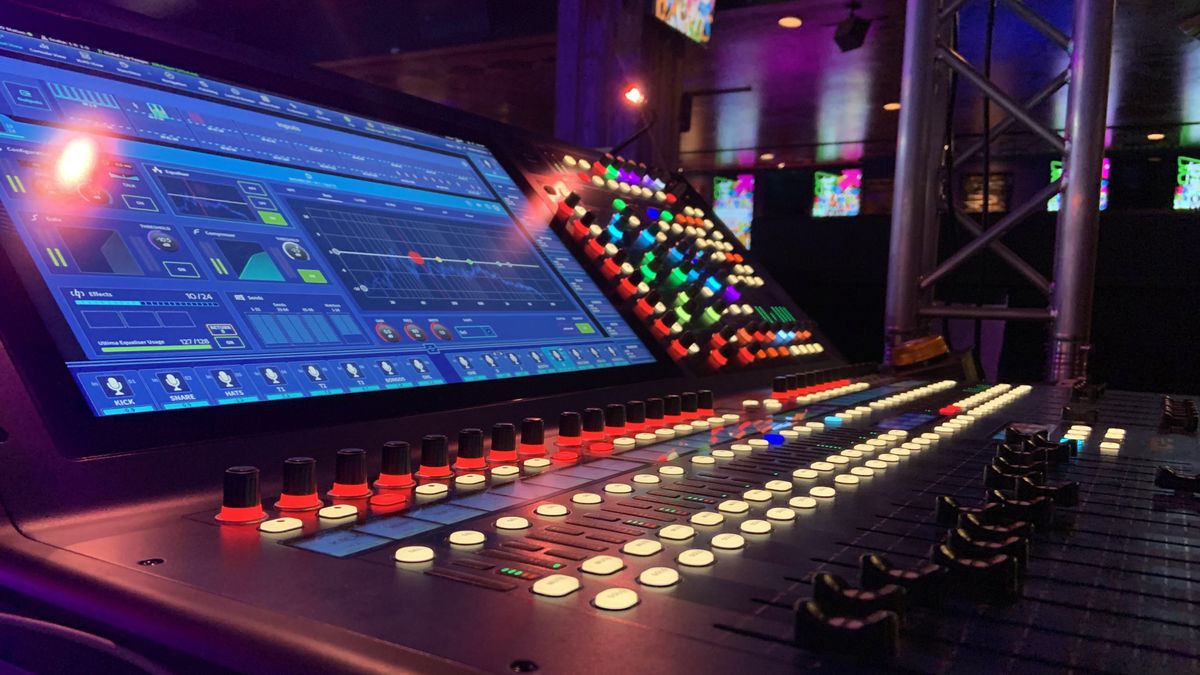 A Midas HD96 in the House of Blue Las Vegas, lit up in multicolor lights and illuminated monitor. 