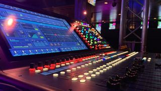 A Midas HD96 in the House of Blue Las Vegas, lit up in multicolor lights and illuminated monitor. 
