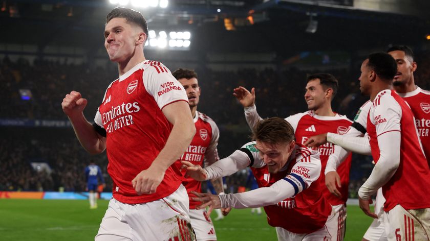  Martin Odegaard of Arsenal pushes teammate Viktor Gyokeres to celebrate after scoring his team's second goal during the Carabao Cup Semi Final First Leg match between Chelsea and Arsenal at Stamford Bridge on January 14, 2026 in London, England. 