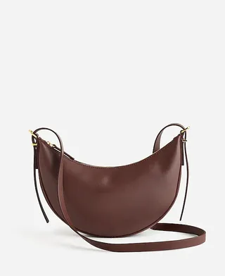 Madewell, a mini bolsa crossbody conversível essencial com alça superior