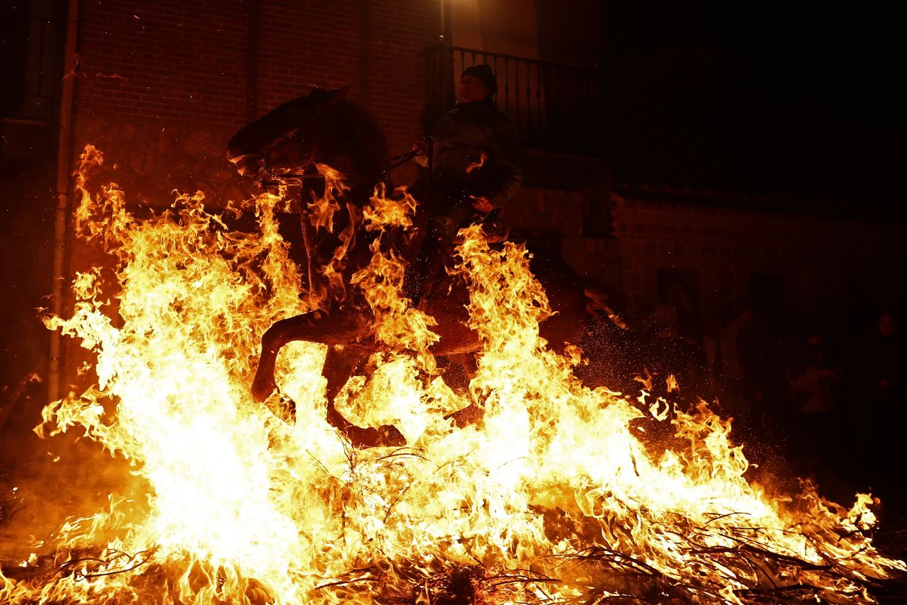 A horse riding through fire.