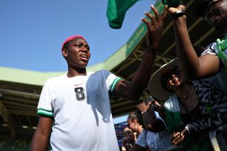 Asisat Oshoala meets fans at the end of the women's group C football match between Japan and Nigeria of the Paris 2024 Olympic Games at La Beaujoire Stadium in Nantes on July 31, 2024.