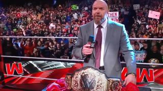 Triple H unveiling the WHC on Raw