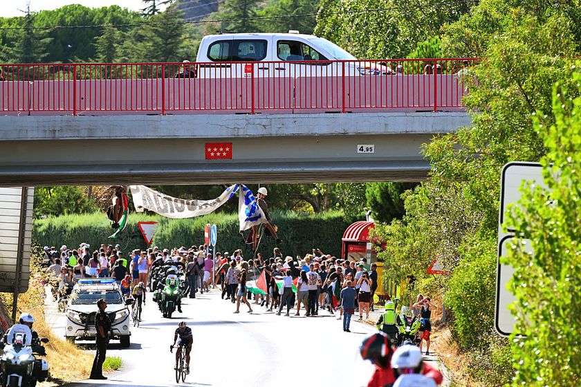 BOLA DEL MUNDO, SPAIN - SEPTEMBER 13: Pro - Palestines stop the race during the La Vuelta - 80th Tour of Spain 2025, Stage 20 a 164.8km stage from Robledo de Chavela to Bola del Mundo. Puerto de Navacerrada 2253m / #UCIWT / on September 13, 2025 in Bola del Mundo. Puerto de Navacerrada, Spain. (Photo by Tim de Waele/Getty Images)