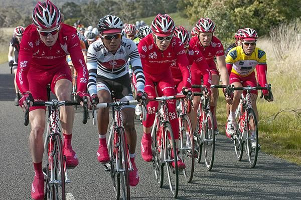 The team of Drapac Porsche on the front of the peloton working for their tour leader Rhys Pollock in yellow.