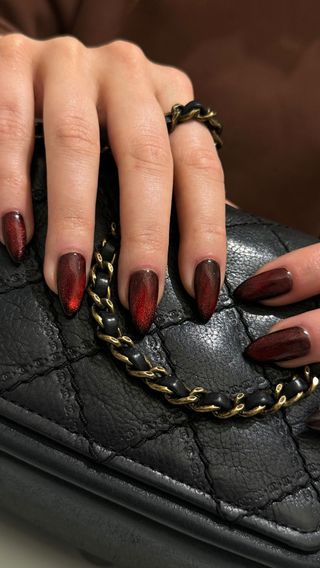 dark red cat eye nails