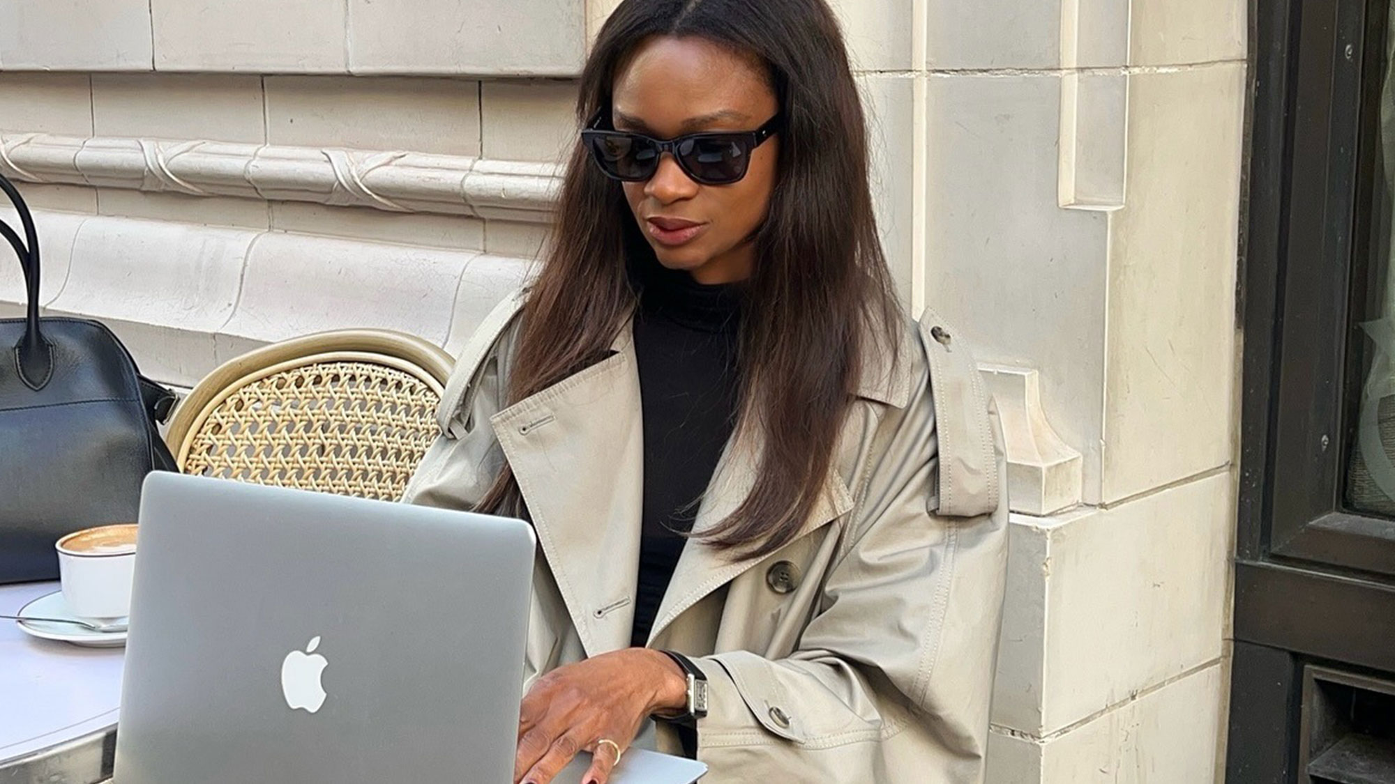 A fashion person in a trench coat 