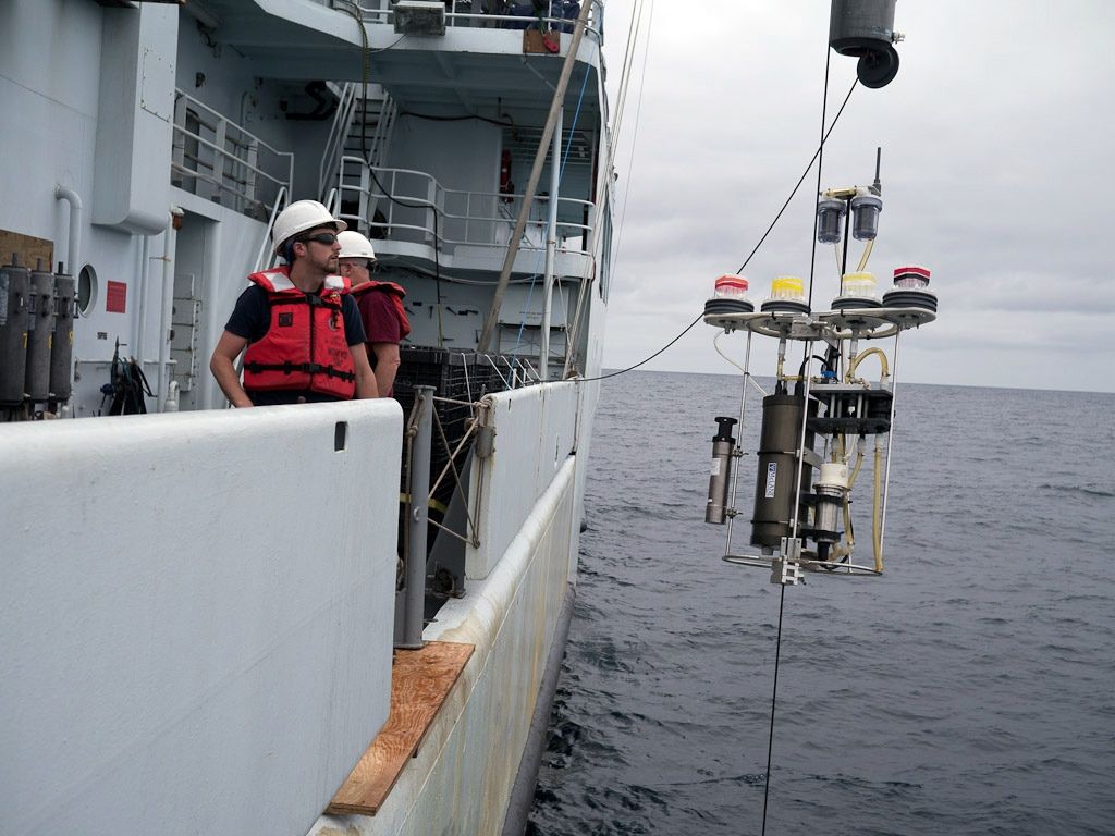 A McLane pump being deployed from R/V Thompson during the West Pacific GEOTRACES cruise in 2013 helped researchers gather small particles of organic matter to which mercury attaches and sinks to intermediate depths (100 to 1,000 meters) in the ocean.