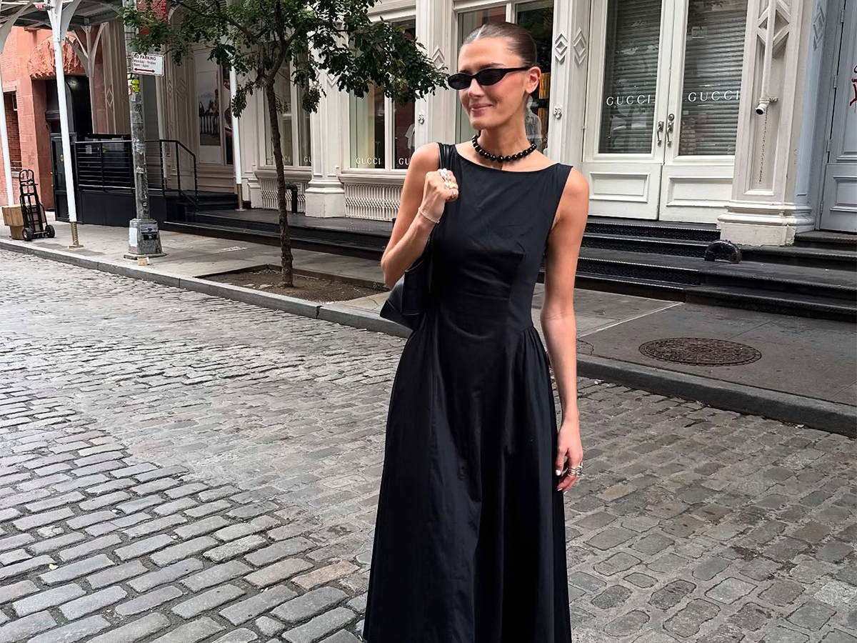 Influential Coco Schiffer wore a black Midi Boatneck dress with a black thong kitten.