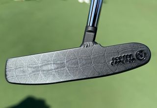 A close up of the Scotty Cameron 009 Prototype