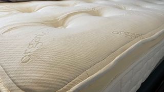 The corner of the organic NaturePedic Concerto Pillow Top mattress we received for testing