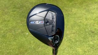 The Titleist GT3 Fairway Wood on a green background