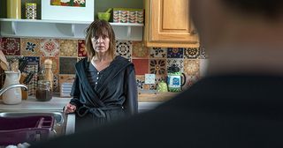 How will Rhona Goskirk react when she finds Pierce Harris in her living room in Emmerdale.