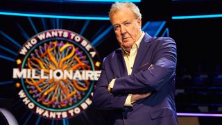 Jeremy Clarkson crosses his arms in the studio for Who Wants to Be a Millionaire? 2024