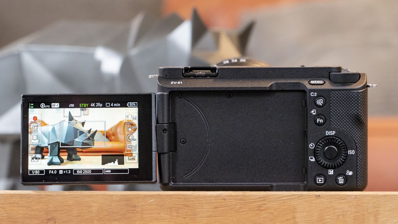 The Sony ZV-E1 camera sitting on a wooden table