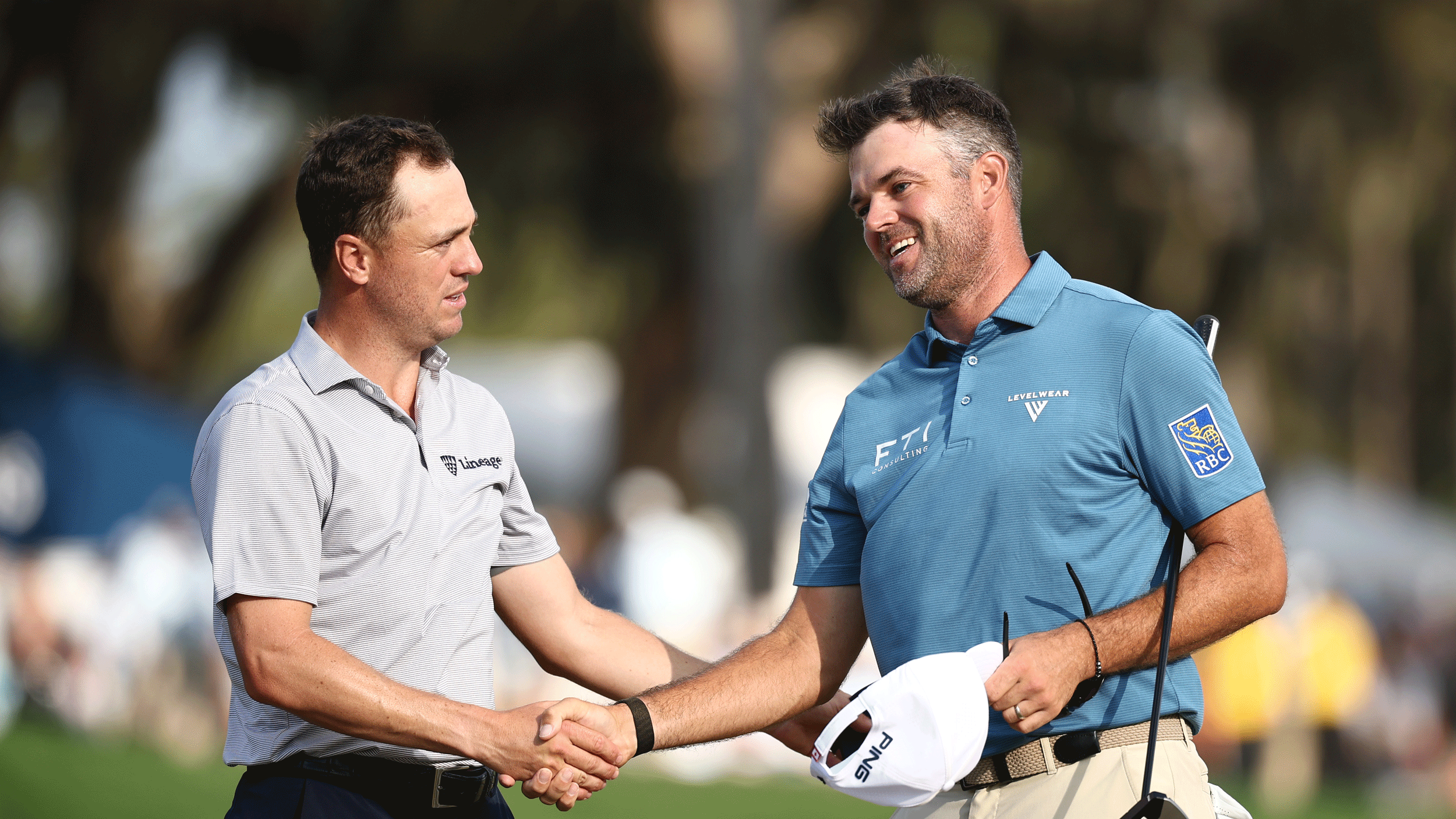 Justin Thomas and Corey Conners shake hands after a round at The Players Championship 2026