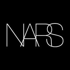 NARS lipstick and blush with three bright, pink flowers.