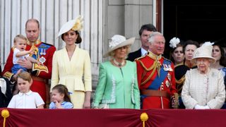 Prince William, Duke of Cambridge, Catherine, Duchess of Cambridge, Prince Louis of Cambridge, Prince George of Cambridge, Princess Charlotte of Cambridge, Camilla, Duchess of Cornwall, Prince Charles, Prince of Wales, Princess Anne, The Princess Royal, Queen Elizabeth ll, Prince Andrew, Duke of York, Prince Harry, Duke of Sussex and Meghan, Duchess of Sussex stand on the balcony of Buckingham Palace following Trooping the Colour on June 08, 2019 in London, England