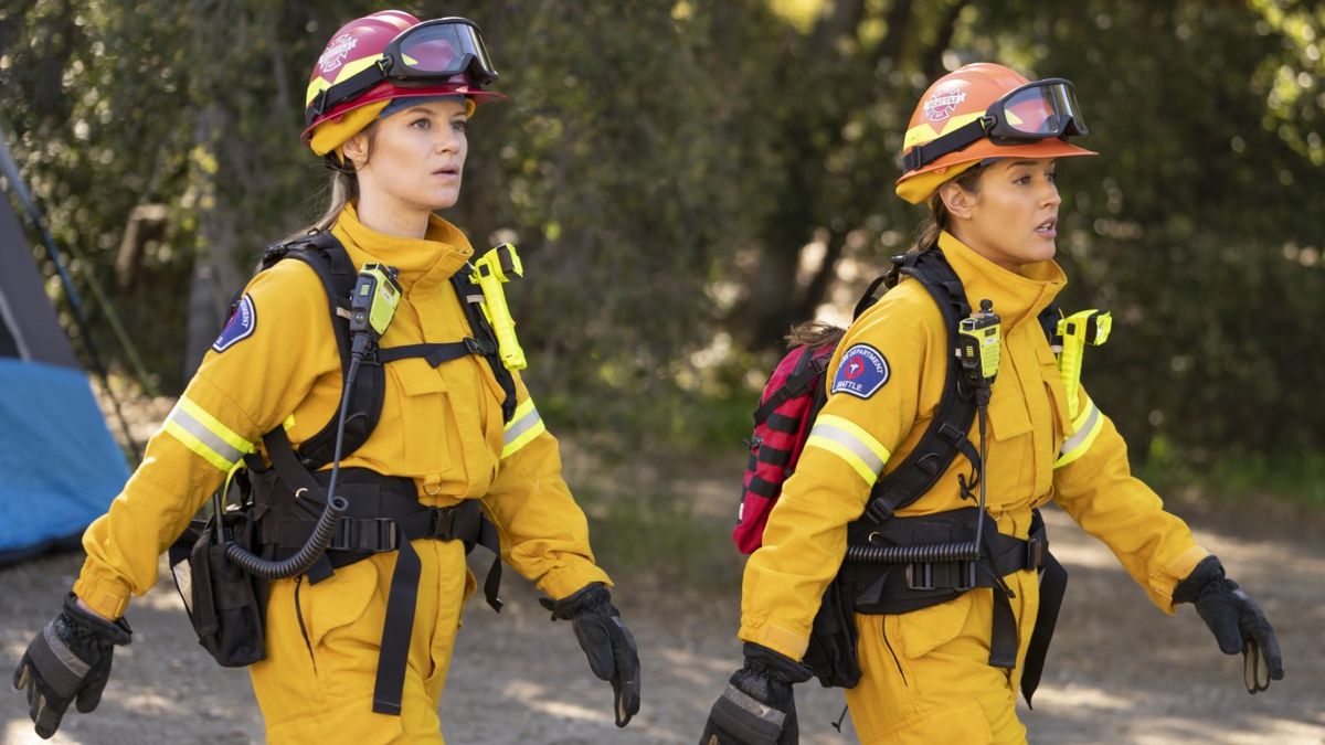 Maya Bishop (Danielle Savre) and Andy Herrera (Jaina Lee Ortiz) walk in the forest during the Station 19 episode &quot;How Am I Supposed to Live Without You.&quot;