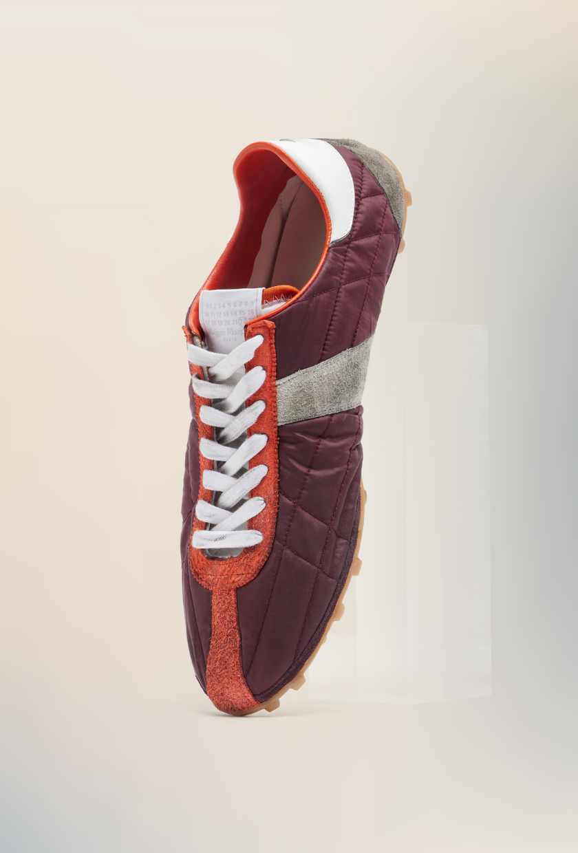 An image of Maison Margiela sprinter trainers.
