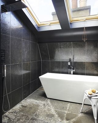 Bath beneath rooflights in Michelle Chian and Ross Jones' apartment