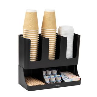 A black coffee organizer with coffee cups and lids and coffee pods in it