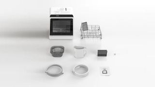 HAVA Compact Countertop Dishwasher components laid out on white background