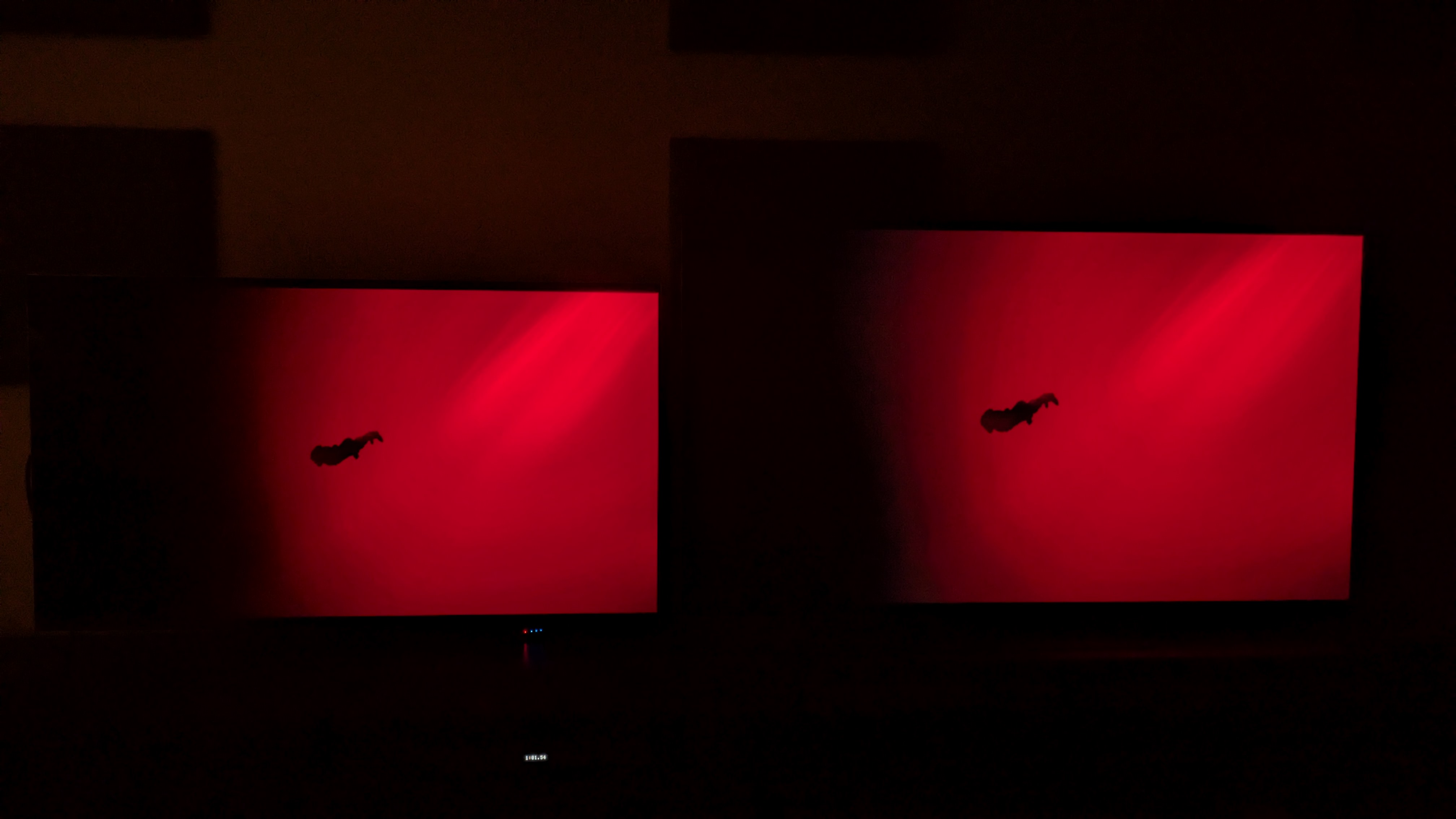 The LG G5 (left) and LG G6 (right) showing a scene from The Green Knight in Dolby Vision where Gawain swims through a red lake. Here, the G5 actually shows less color banding than the G6.