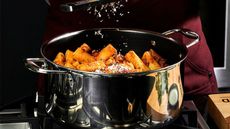 HexClad saucepan filled with tomato pasta