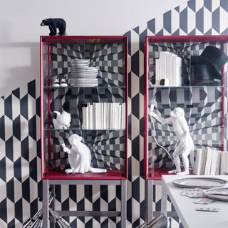 room with geometric pattern printed wall and shelf on wall
