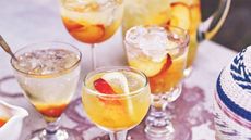 glasses of sangria with fruit in