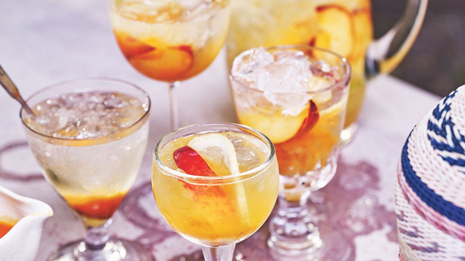 glasses of sangria with fruit in