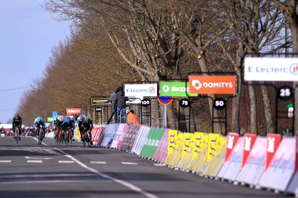 NTT’s Giacomo Nizzolo sprints to victory on stage 2 of the 2020 Paris-Nice, at a stage finish in Chalette-sur-Loing devoid of spectators, who were kept at a distance due to fears about the coronavirus spread