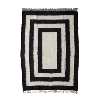 Black and white striped rug